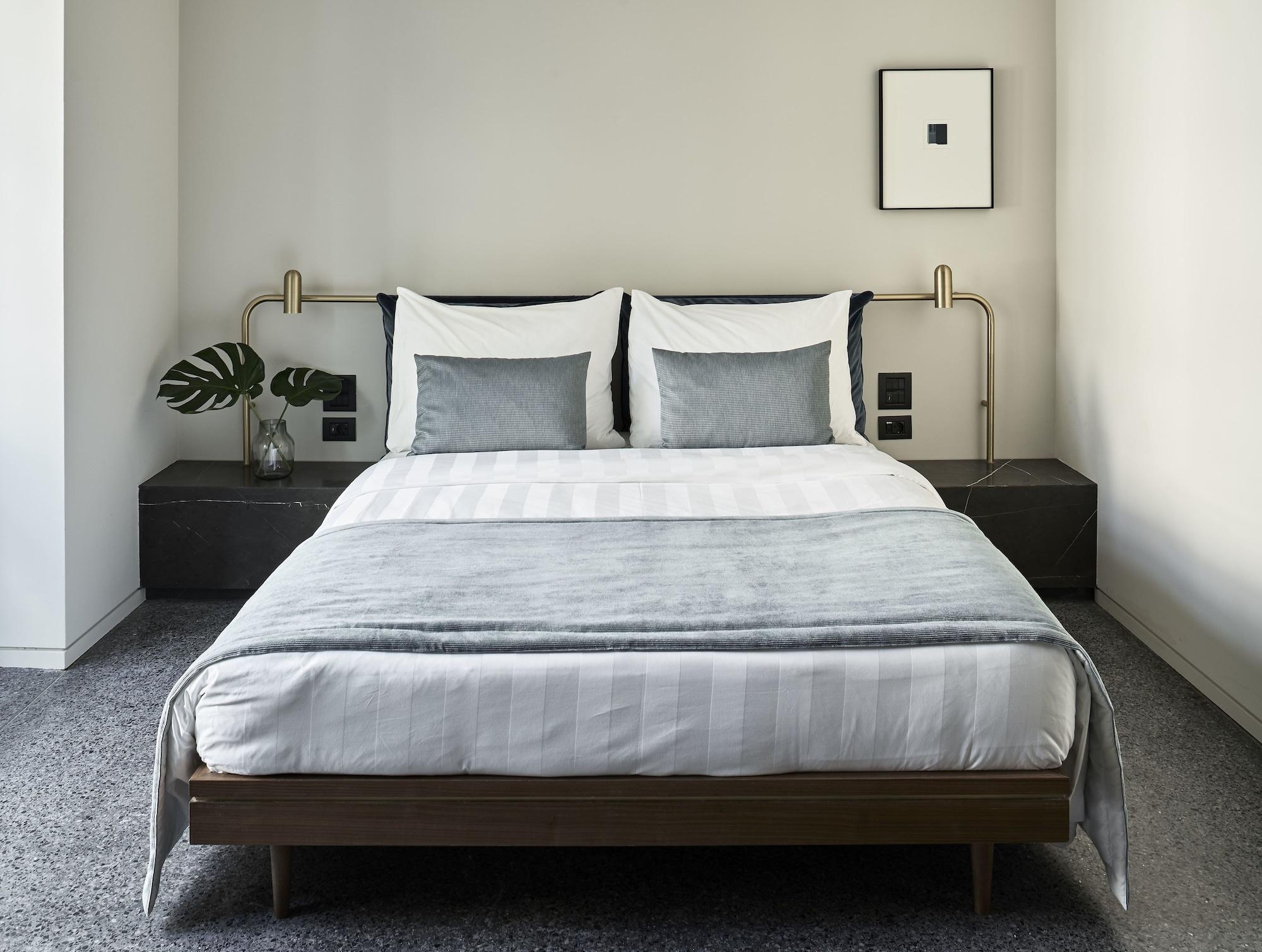 Perianth Hotel Athen Eksteriør billede A bed
